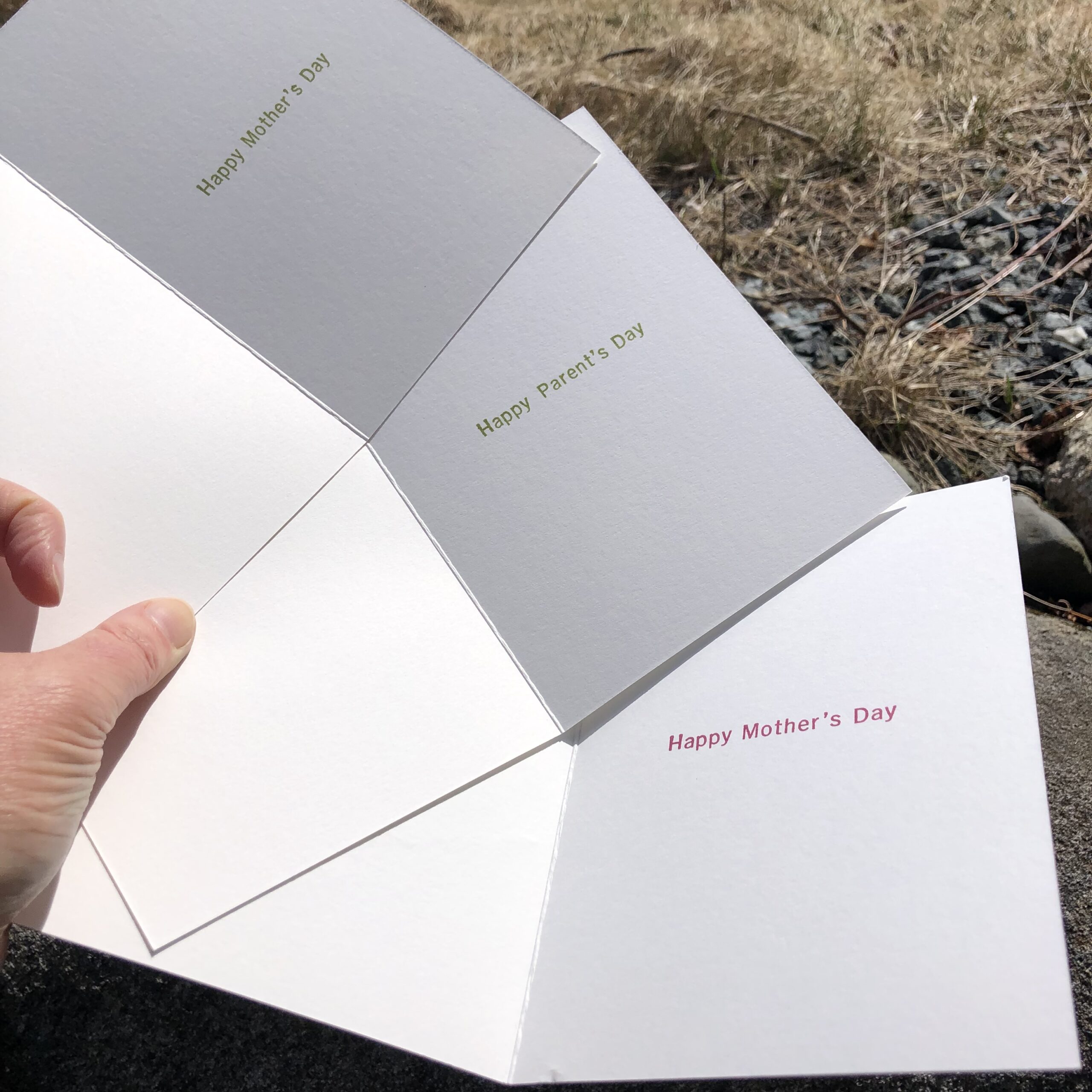 Three white cards open to show the interior messages, “Happy Mother’s Day” and “Happy Parent’s Day” in green ink. (The message in red ink is for the Loon & Chick card, separate listing.)